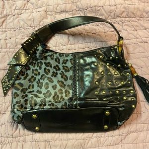 Sharif leather and leopard shoulder bag. Unique